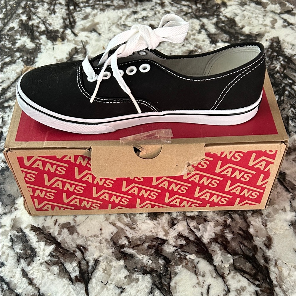 Vans Black and White Low-Top Canvas Sneakers